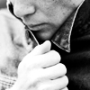 thatyourefuse: A man hunching into the collar of his jacket. ([writing] (he says in parentheses))