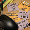 queelez: 'The Cake is a Lie' scribbled on several sticky notes (the cake is a lie)