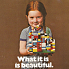 xenacryst: Young girl holding a home-built LEGO creation, text: "What it is is beautiful." (LEGO: What it is is beautiful)