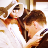 muccamukk: Phryne putting Jack's tie back on, both leaning in close. (MFMM: Tied to You)