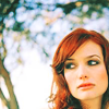 sheikah: (alison sudol: looking over shoulder)