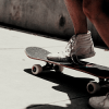 skatefree_diehard: image of a person riding a skateboard (Default)