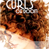 ninamalfoy: a woman (eyes closed) with brown curls (a LOT of them!), upper middle: 'Curls of Doom' in white (doomy curls)
