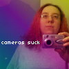 backtothelight: Photo of me in the mirror, holding up camera. (Default Me)