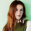 bookblather: A picture of Neko Case in a green sweater. (in the heart: ivy)