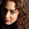 bookblather: A picture of Regina Spektor with her face half in shadow. (in the heart: olivia)
