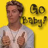 northern: Lance Bass holding up two thumbs, looking dorky. text: "Go Baby!" (lance says: go baby!)