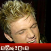 northern: Nick Carter biting down on a photoship added red footer, containing the name "northern" (blooded tooth nick)