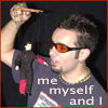 northern: Chris Kirkpatrick in orange goggles is holding up a marionette doll of himself. text:"me myself and I" (memyselfandi)