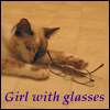 katherine: Girl with glasses: Fuzzy cat with a folded pair of glasses by her paw. (girlcat)