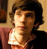 semicharmed: (loves his collared shirt/sweater combo)
