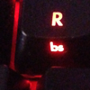metahacker: Close-up on a keyboard; one keycap, labeled R and BS, is visible (bs)