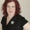 sistawendy: me looking confident in a black '50s retro dress (mad woman)
