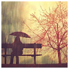bellflower: A woman sits under an umbrella besides a red tree ([Misc] Rainy days)