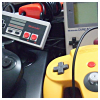 bellflower: Various vintage game controllers sit together ([Misc] Gaming across the ages)