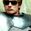 king: Arthur, in chainmail and sunglasses, twists his lips in a sneer. (✖ z thoust seeth me rolling)