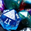 toffeecat: blue D20 laid on top of my dice pile (shinydice001)
