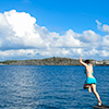 naye: blue sea, fluffy summer clouds, a figure leaping into the water (jump in!)