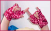 pinesandmaples: My hands making the rock symbol.  (knitting: gloves)