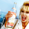 coco_waters: an excited Patsy, clutching a bottle. (tv // AbFab // bottoms up darling)