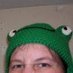 keffy: Selfie of Keffy wearing a crocheted frog hat. (frog, frog hat, hat, me)