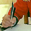 sharpiefan: Close-up of a hand writing with a quill pen (Writing)