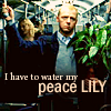 caffienekitty: Sergeant Angel from Hot Fuzz holds a large plant while riding public transport "I need to water my peace lily (hf-peacelily)