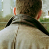dulcinea: Dean Winchester's back, featuring his leather jacket's popped collar ([SPN] Were you raised in a barn?)