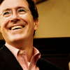 sarcasticsra: A picture of Stephen Colbert wearing a pink shirt, smiling brightly. (kansas city: sam)