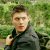 dulcinea: Dean Winchester shooting a perturbed look over his shoulder. ([SPN] 'scuse me backpackin' here)