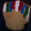 thnidu: 10x10" shaped like a Hanukkah menorah, stripes of frosting for candles. lj:talvinamarich&daughter. Delicious! (Hanukkah cookie)