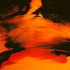 firelull: a person mostly obscured behind a blur of fire colors (firelull)