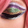 telesilla: an eye with glittery glam eye make up (glitter eye)