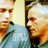 anoyo: Jack and Daniel, Jack has his eyes closed, text "Don't let go" (sg1 j/d)