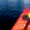 ironymaiden: POV image of kayak bow with paddle at rest on a lake (kayak)