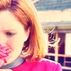 lilly_c: Kathryn smelling a flower (Kathryn - flower)