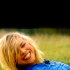 midnightjuly: rose tyler, lying on grass, smiling brightly (bad wolf)