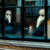 noctiluca: (faces in the window)