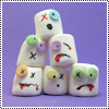 pensnest: six marshmallows in a rough tower; each has woeful, zombified features (Zombie marshmallows)