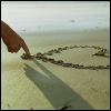 waterdaughter: (drawing in the sand)