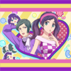 amedia: Girl with short green hair dressed like a pilot in a purple top with a white scarf around her neck; brunette girl in pretty magenta-and-white checkered dress with pink headband; both girls contained together within a heart shape (KHNM - closing credits)
