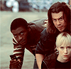 anoyo: Hardison, Eliot, and Parker sneaking out from behind the boxes and sort of in a pile. (leverage eliot parker hardison adorable)