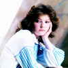 auroracloud: Nyssa of Traken in white-blue striped shirt, leaning her hand on her cheek, looking thoughtful (Nyssa thoughtful)