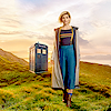 auroracloud: Thirteenth Doctor with green hills and the TARDIS behind her (Thirteen TARDIS)