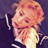 venusundae: taeyeon with orange hair curled up into herself (０７９ (we're running out of time))