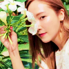 venusundae: jessica poses for the camera with flowers in front of her face (１３９ (our little secret))