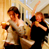 fullupwithfire: Sally Owens and Aunt Jet (Practical Magic) dancing in their kitchen, holding drinks (+ celebration)