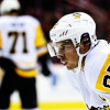 7iris: Sidney Crosby in profile; Evgeni Malkin in the background (gameface)