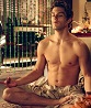 noxelementalist: Big Wolf on Campus' Tommy Dawkins circa season 3; he is meditating shirtless and white wrap pants in a full lotus pose, background is of stereotypical shrine, coplete with green bead curtain and altar (Tommy Dawkings)