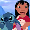 independence1776: Lilo smiling; Stitch looking mischevious (Lilo and Stich; huh)